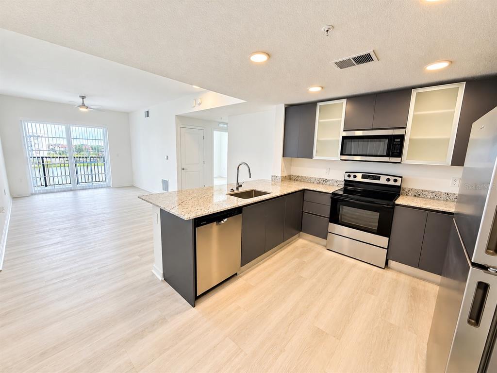 5591 MILLENIA PARK BOULEVARD UNIT 401, ORLANDO, FL — photo 2 of 16