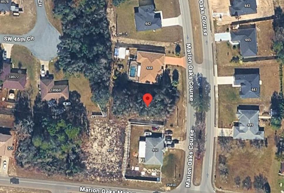 This is an aerial map view of a residential lot located between two houses — 0 SW MAR OAKS CRS, OCALA, FL