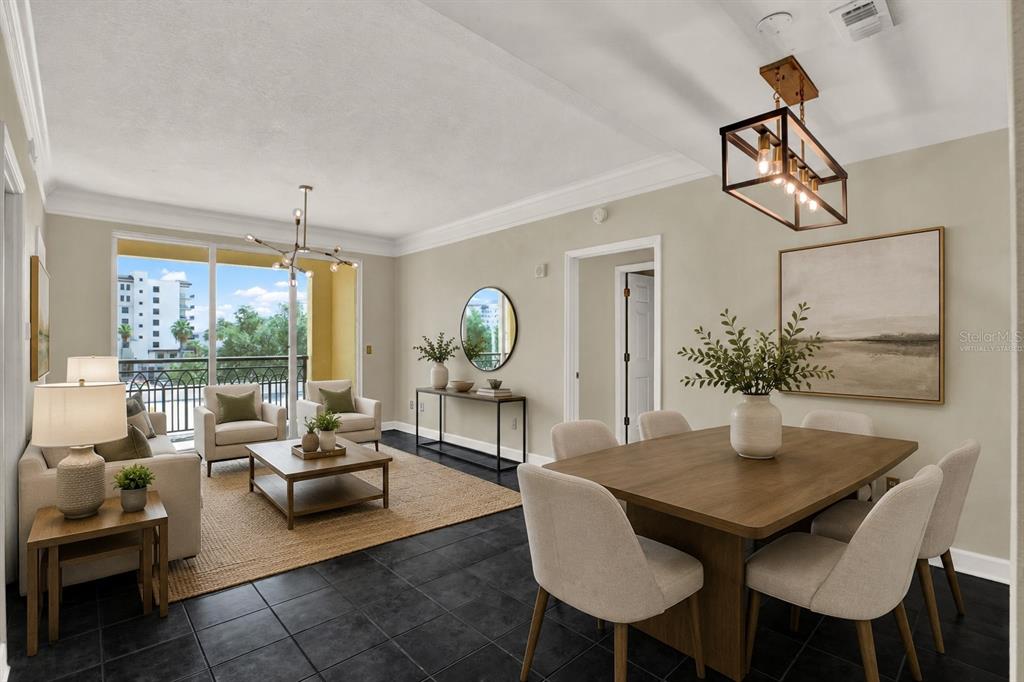 A living and dining area with dark tile floors, neutral furniture, and a balcony view — 345 BAYSHORE BOULEVARD UNIT 310, TAMPA, FL