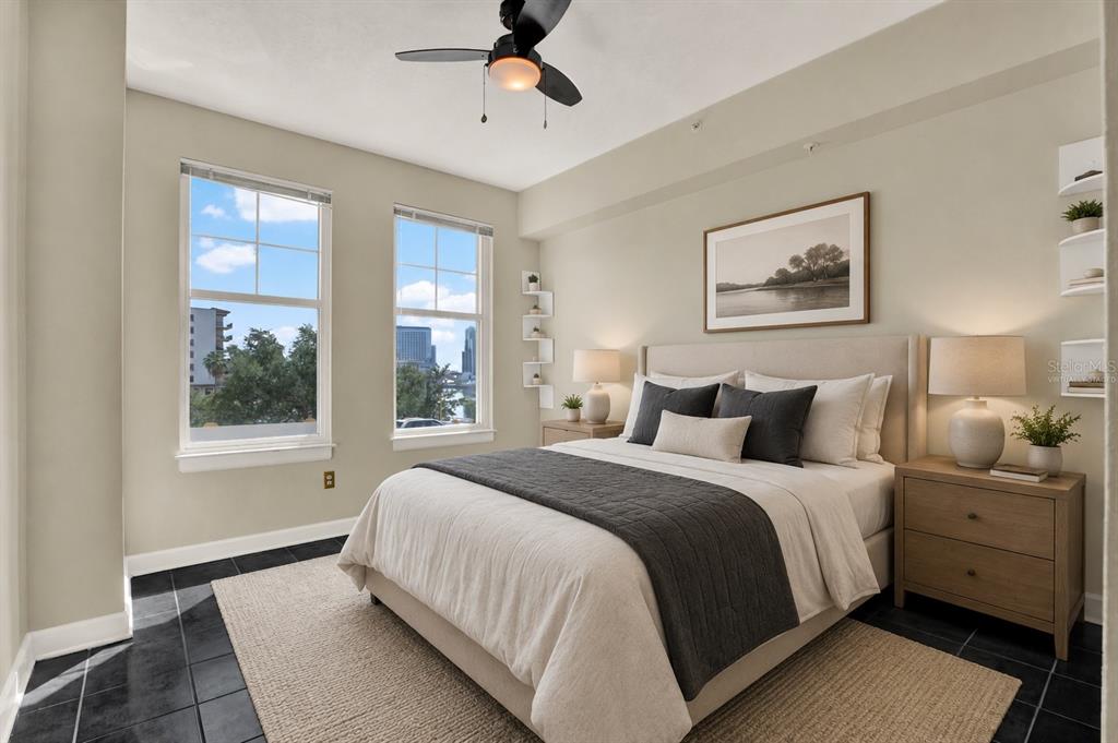 A bedroom features a queen bed, two nightstands, a ceiling fan, and city view windows — 345 BAYSHORE BOULEVARD UNIT 310, TAMPA, FL