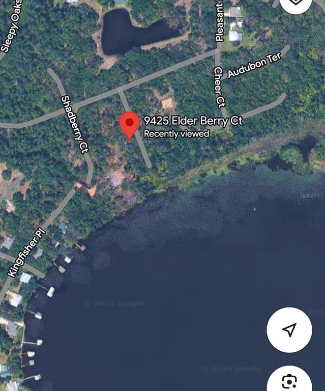 This is a satellite map view showing a residential lot near a lake — 9425 ELDER BERRY COURT, SEBRING, FL
