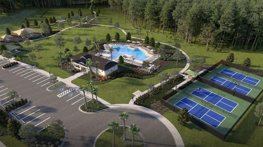 This rendering shows a community amenity center with a pool, clubhouse, parking, and tennis courts — 9871 PELICAN COAST DRIVE, DADE CITY, FL