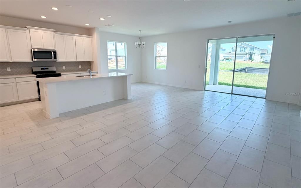6736 SPOTTED EAGLE LOOP, HOWEY IN THE HILLS, FL — photo 2 of 12