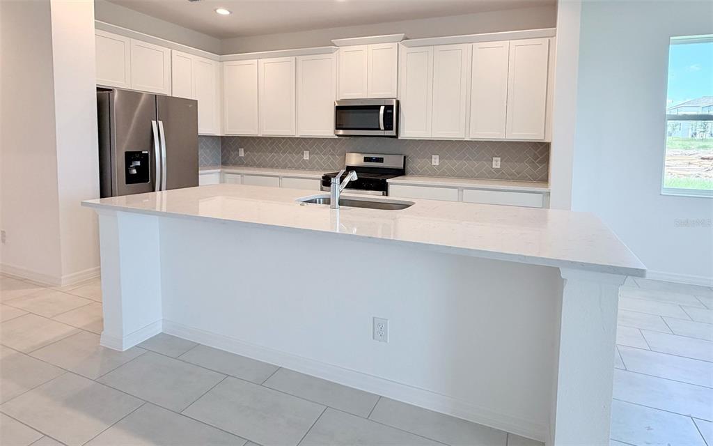6736 SPOTTED EAGLE LOOP, HOWEY IN THE HILLS, FL — photo 3 of 12