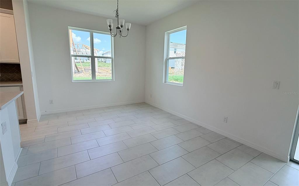 6736 SPOTTED EAGLE LOOP, HOWEY IN THE HILLS, FL — photo 5 of 12