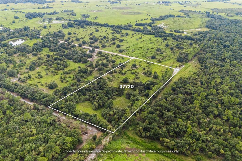 An aerial view shows a rectangular plot of land marked with property boundaries — 37720 KVILLE ROAD, MYAKKA CITY, FL