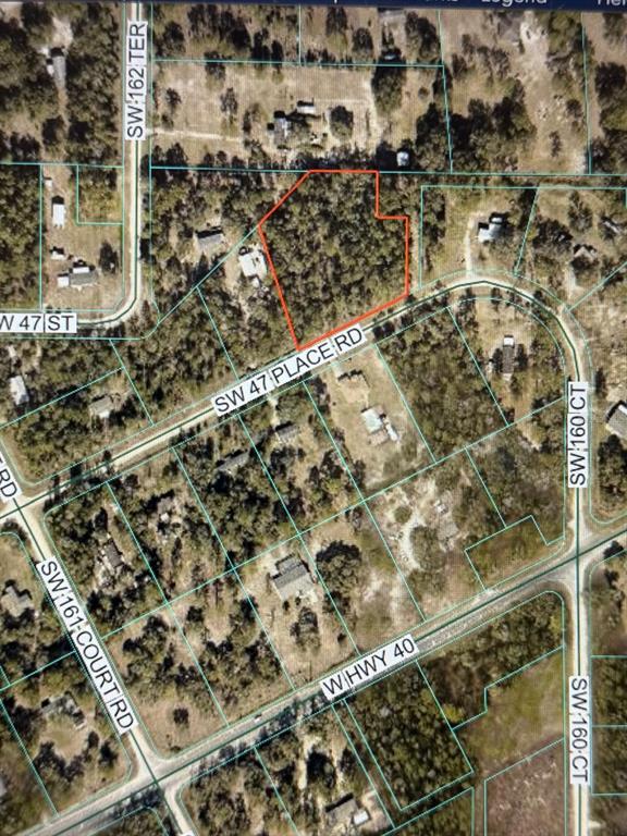 This is an aerial map showing a wooded lot outlined in red near several roads — 00 SW 47TH PLACE ROAD LOT 6, OCALA, FL