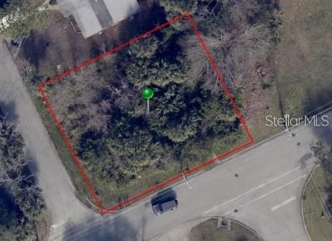 This is an aerial map view of a vacant, wooded corner lot — 285 LINCOLN AVENUE, ORMOND BEACH, FL