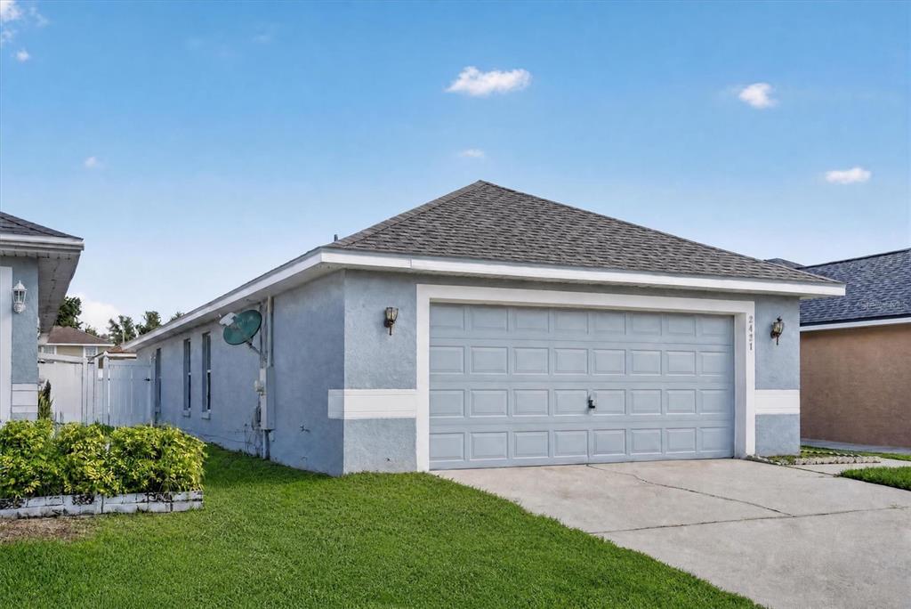 2421 RUDDENSTONE WAY, KISSIMMEE, FL — photo 2 of 29